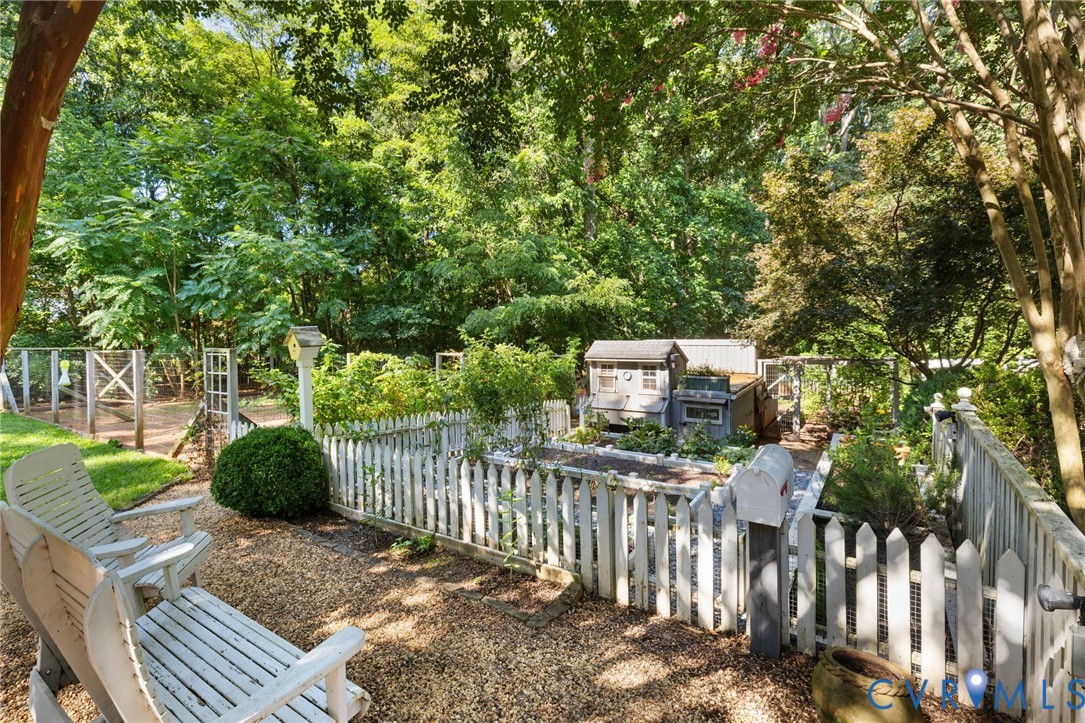 281 Echo Meadows Road Rockville, VA 23146 - Photo 35 of 49 a view of a deck in front of house with a small yard