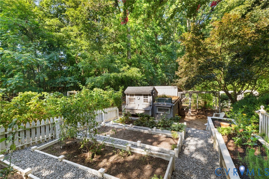 281 Echo Meadows Road Rockville, VA 23146 - Photo 36 of 49 a backyard of a house with yard and outdoor seating