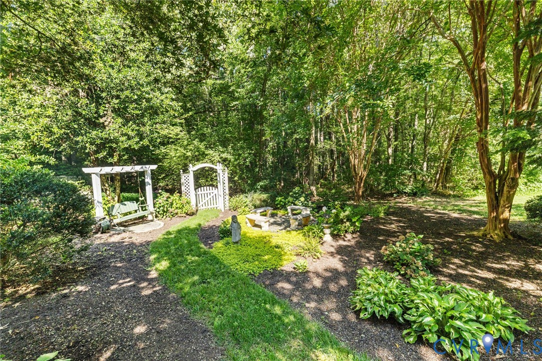 281 Echo Meadows Road Rockville, VA 23146 - Photo 37 of 49 a backyard of a house with lots of green space