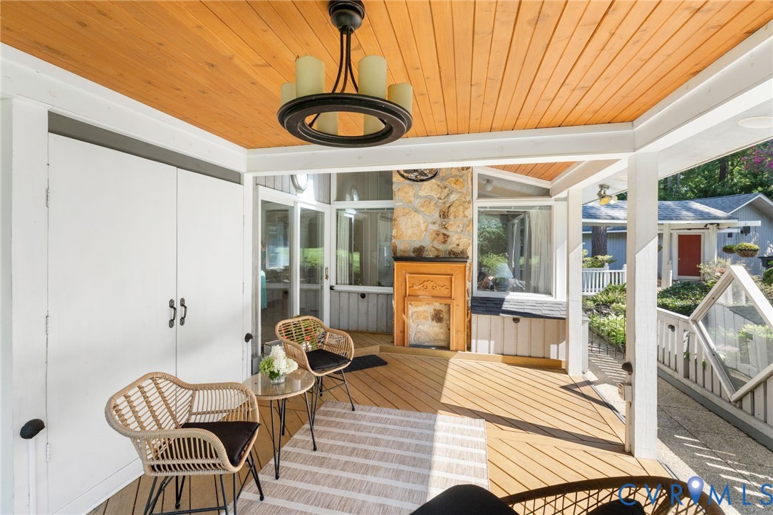 281 Echo Meadows Road Rockville, VA 23146 - Photo 44 of 49 a dining room with furniture and chandelier
