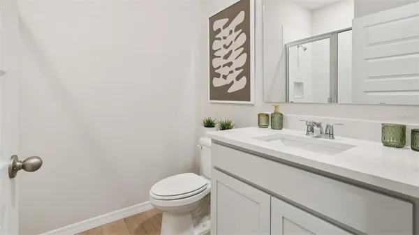 a bathroom with a sink and a toilet