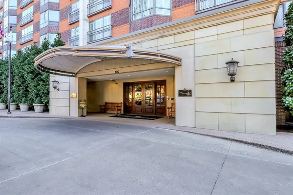 a view of a building with a garage