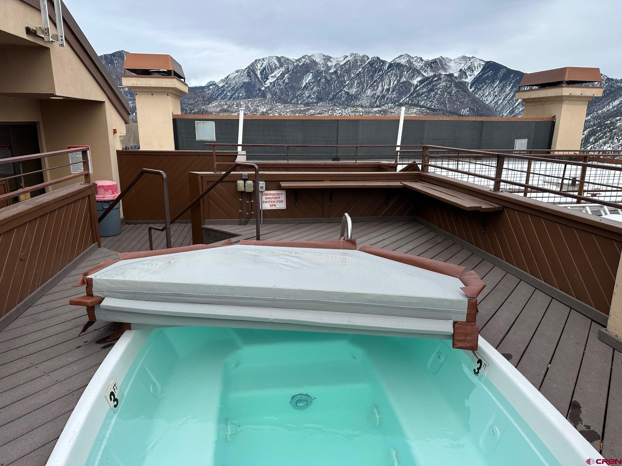 93 Needles Way, Unit 413 Durango, CO 81301 - Photo 30 of 31 a balcony with a table and chairs