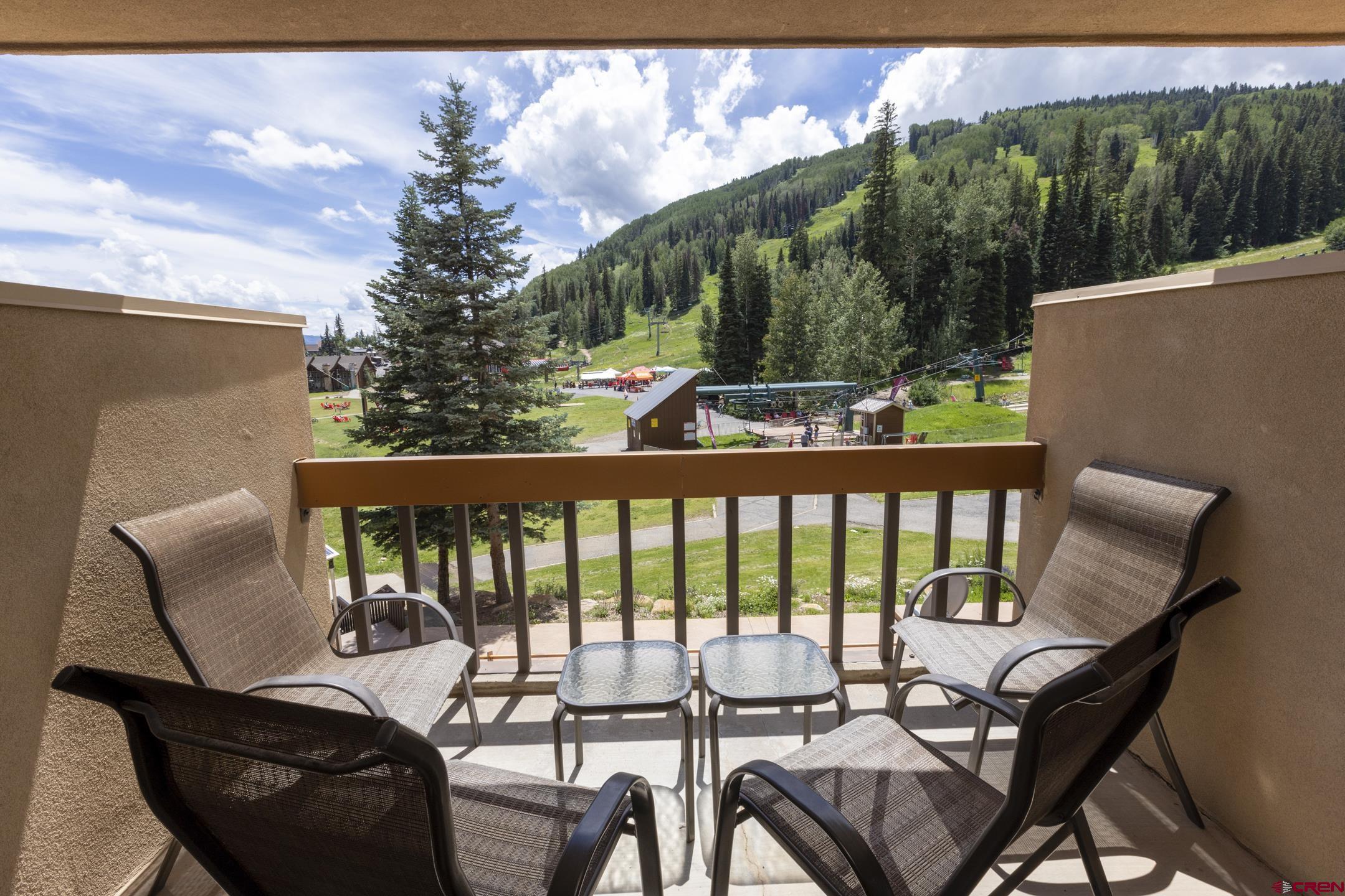 93 Needles Way, Unit 413 Durango, CO 81301 - Photo 4 of 31 a view of a balcony with chairs