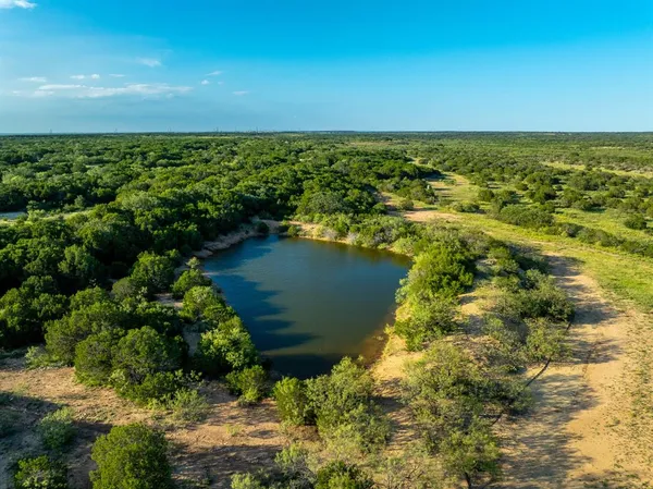 a view of a lake with a city