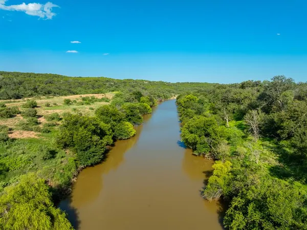 a view of a lake with a mountain in the background