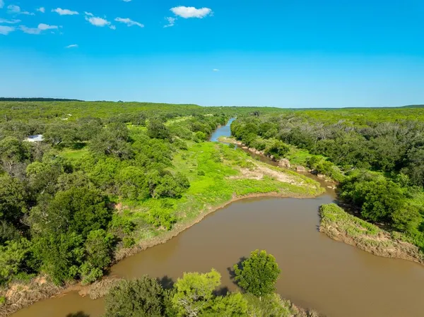 a view of a lake with a city