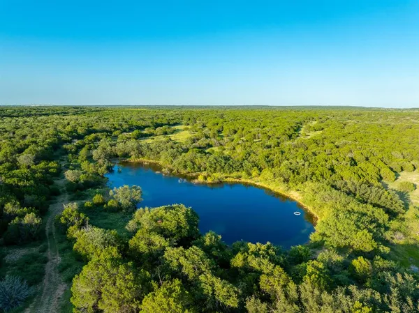 a view of a lake with a city view