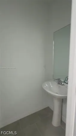 a bathroom with a toilet and a sink