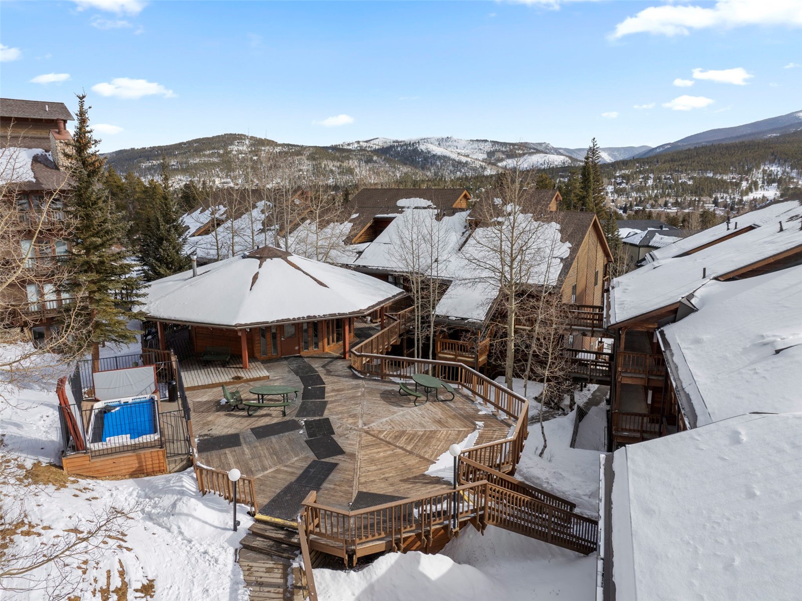 660 Four Oclock Road, Unit 11 Breckenridge, CO 80424 - Photo 22 of 31 Cluhouse is literally steps from this unit, with indoor and outdoor hot tubs, meeting rooms, and facilities.