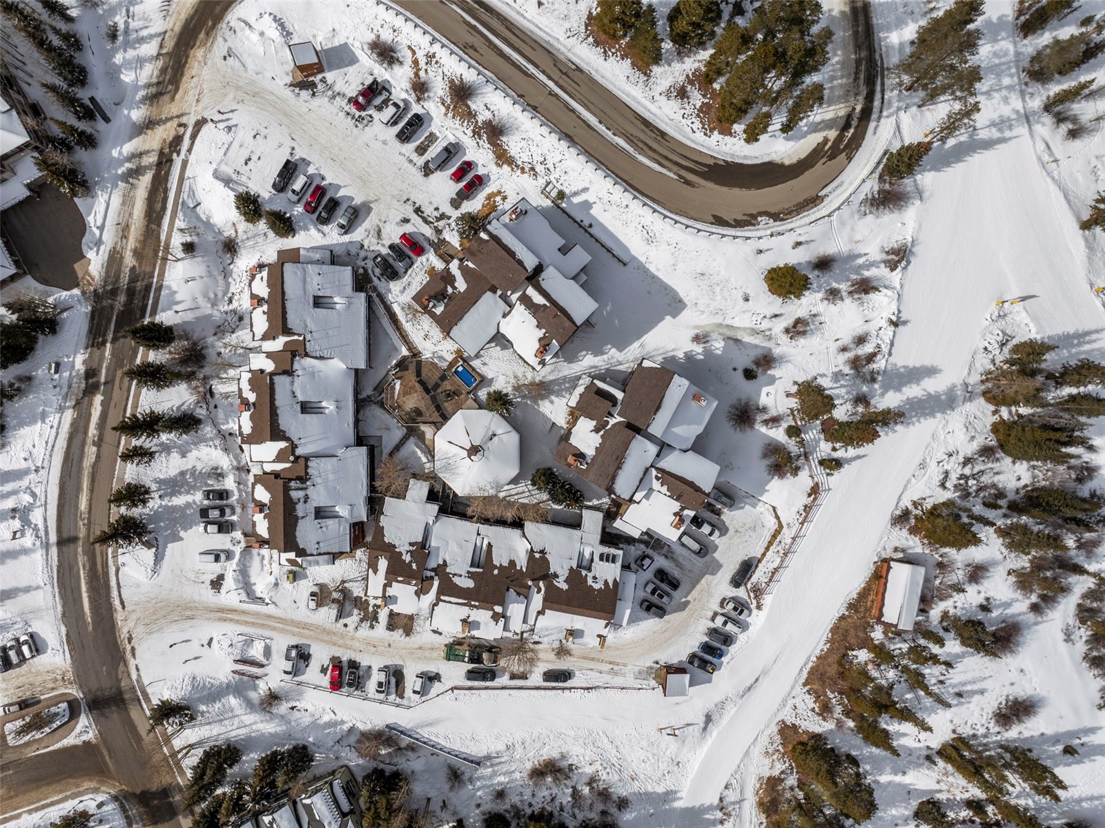 660 Four Oclock Road, Unit 11 Breckenridge, CO 80424 - Photo 23 of 31 Clubhouse, in the center.