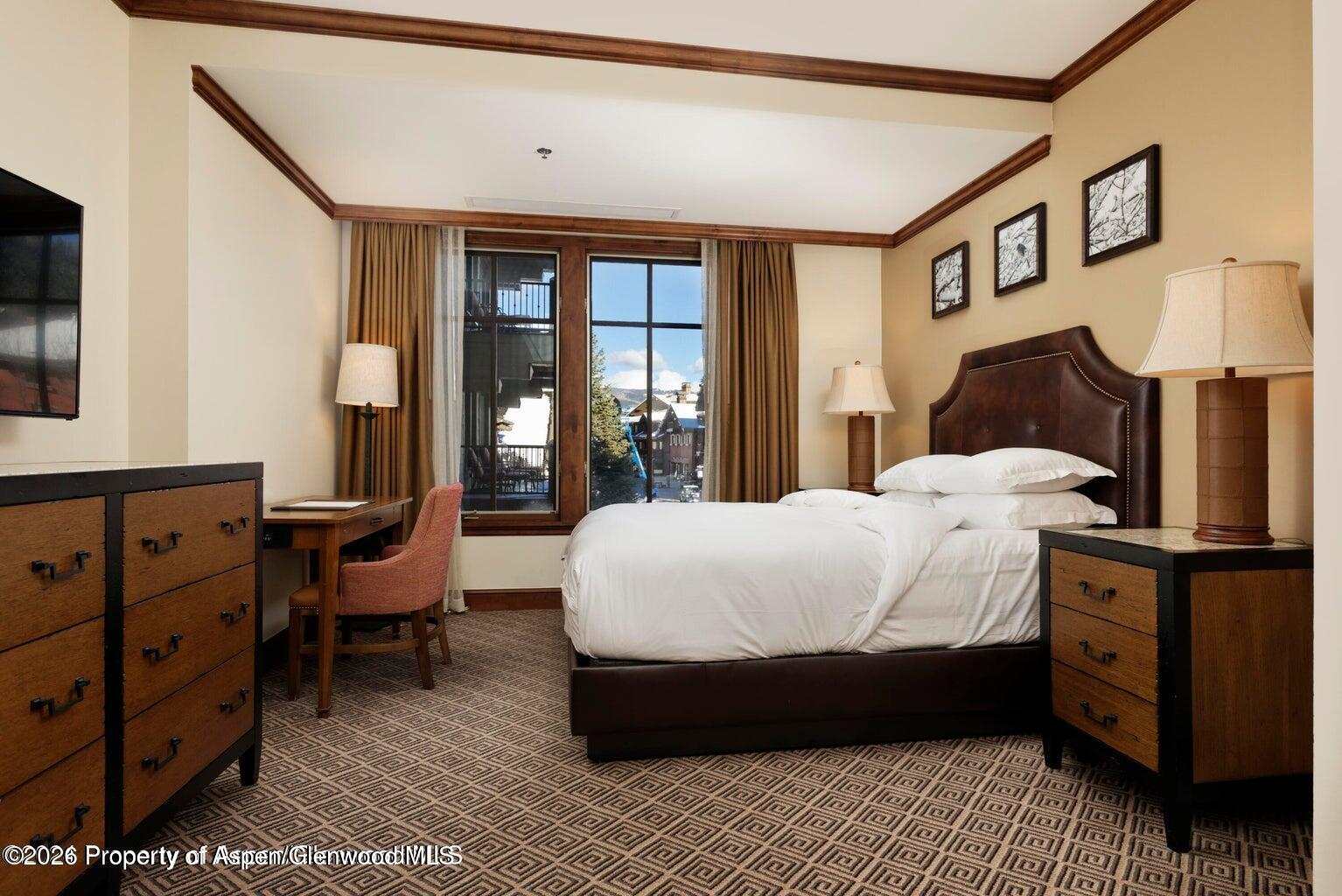 39 Boomerang Road, Unit 841119 Aspen, CO 81611 - Photo 4 of 18 a bed room with a bed and a window