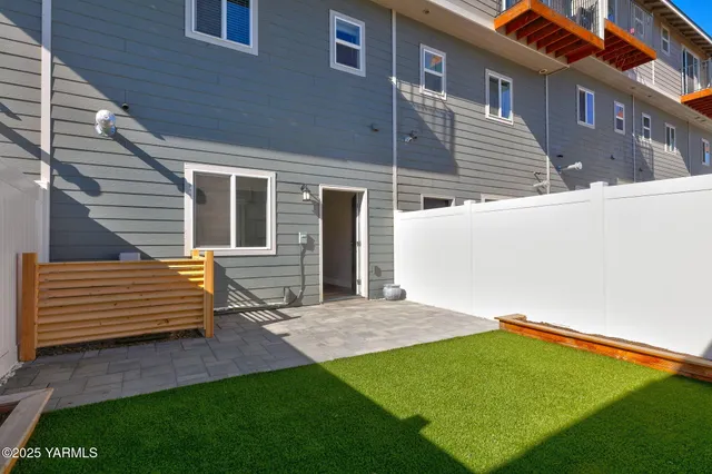 a view of an empty room and garage
