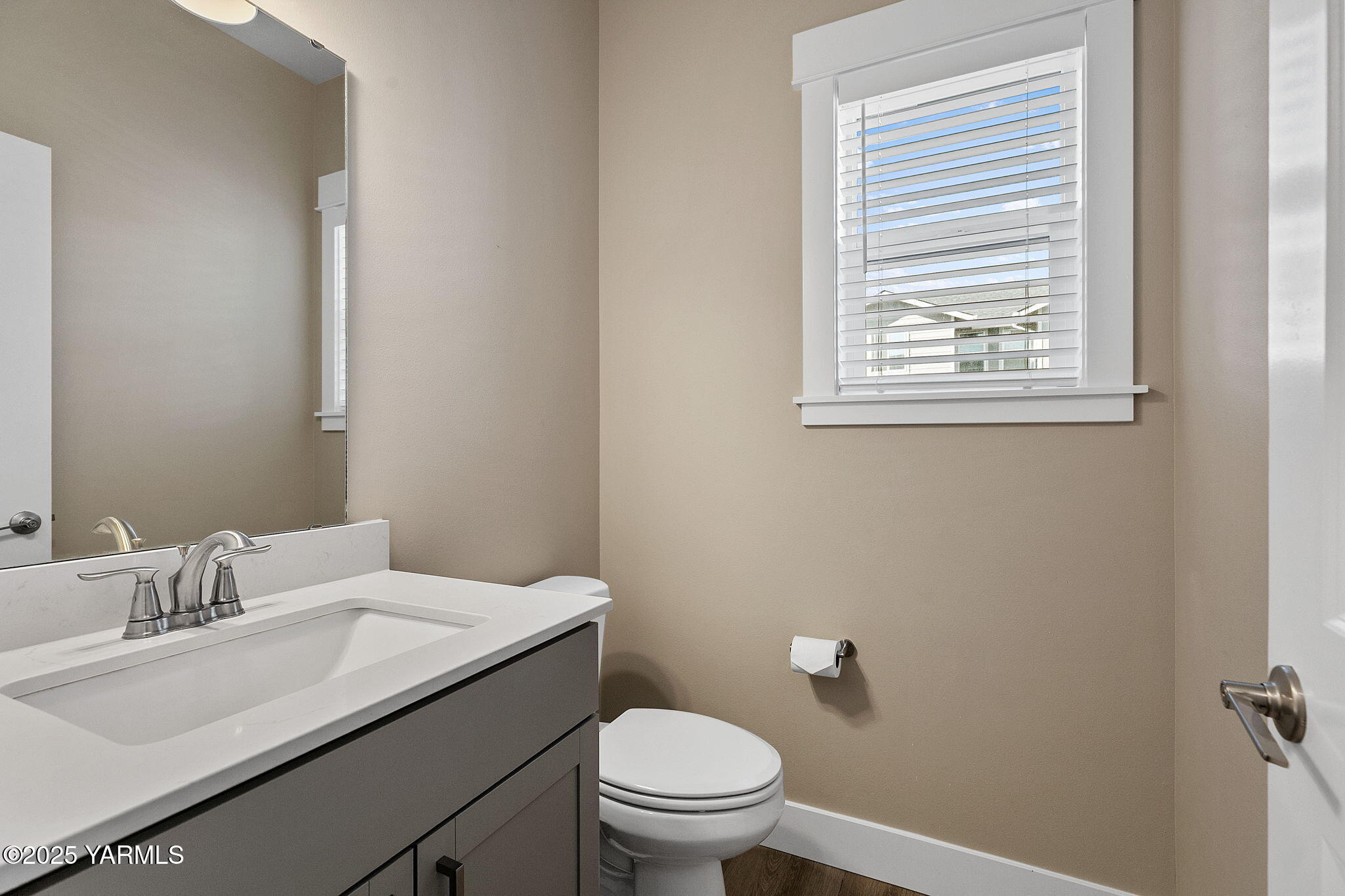 2600 Racquet Lane, Unit 8 Yakima, WA 98902 - Photo 7 of 18 a bathroom with a sink a toilet and a window