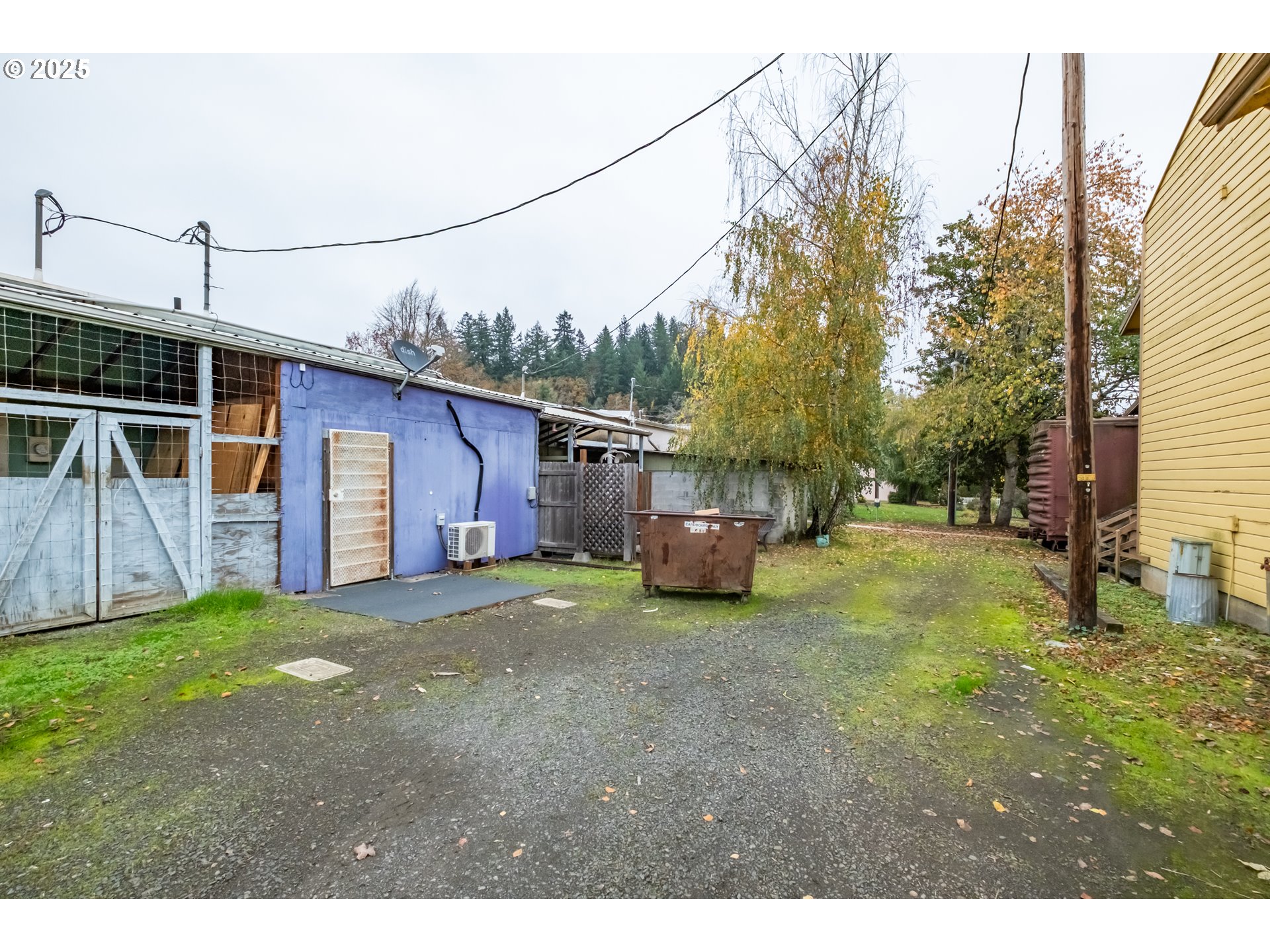 130 Spaulding Avenue Brownsville, OR 97327 - Photo 18 of 26 a backyard of a house with table and chairs