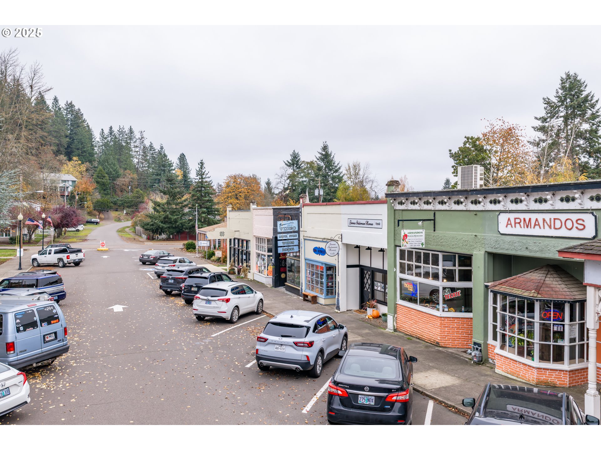 130 Spaulding Avenue Brownsville, OR 97327 - Photo 22 of 26 a cars parked in front of a building