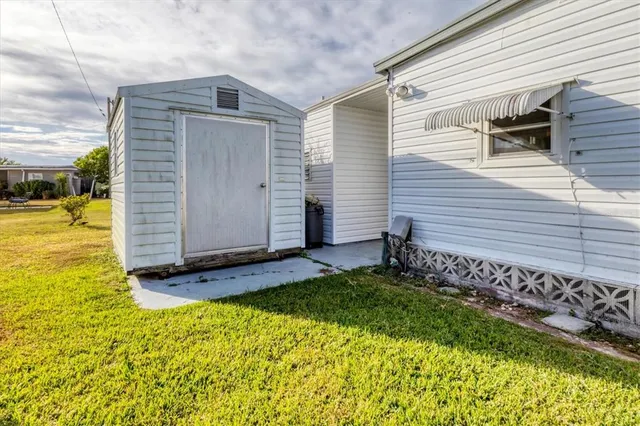 a view of a backyard of the house