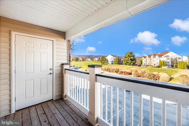 a view of a balcony with window