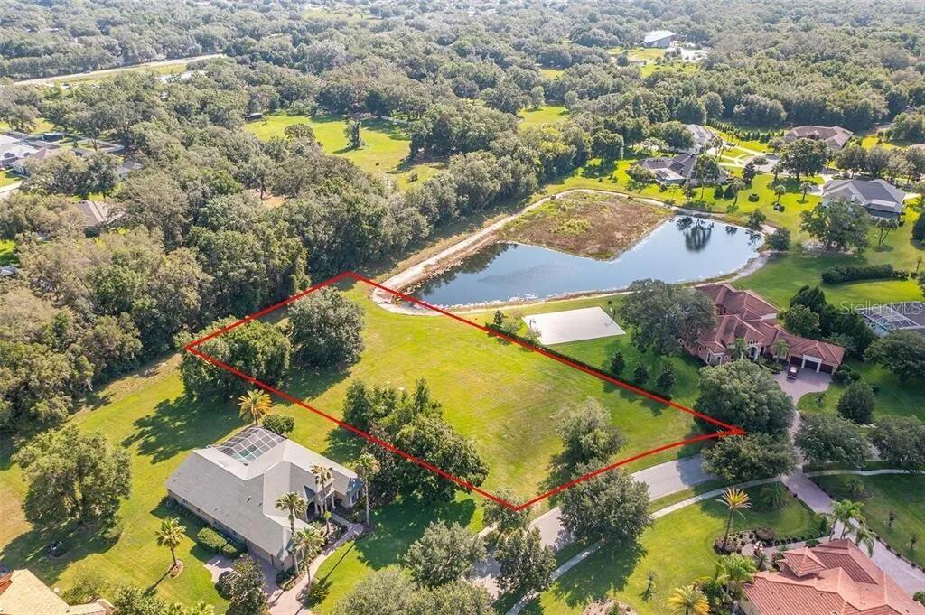 2811 Coastal Range Way Lutz, FL 33559 - Photo 7 of 29 an aerial view of residential houses with swimming pool and outdoor space