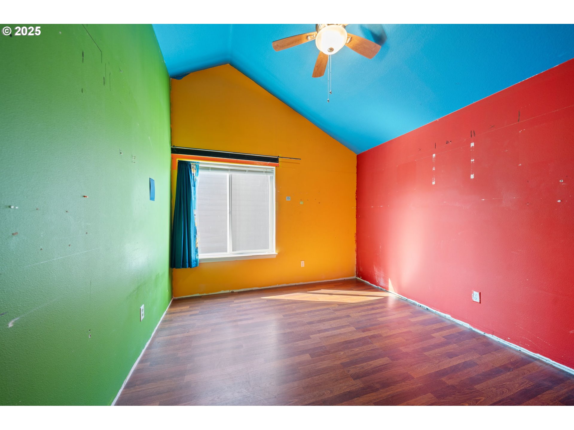 39784 Syblon Lane Sandy, OR 97055 - Photo 19 of 24 a view of an empty room with potted plants and wooden floor