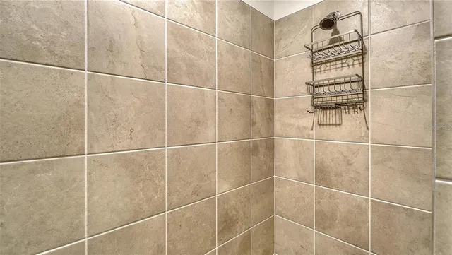 a aerial view of a house with garden space and street view