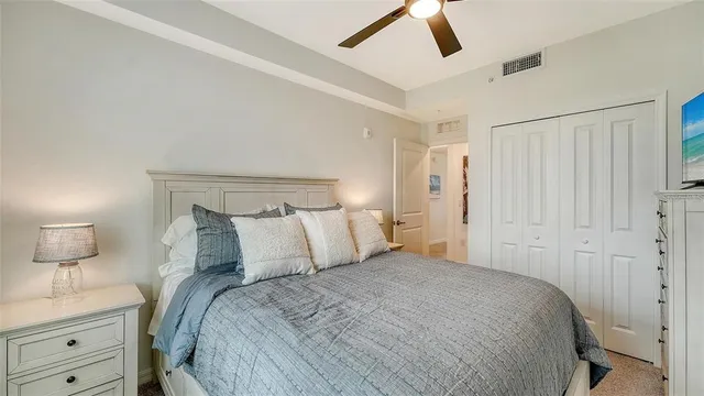 a dining room with furniture a window and wooden floor