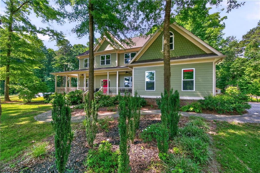 632 Geiger Road Jefferson, GA 30549 - Photo 3 of 55 a front view of house with yard and green space