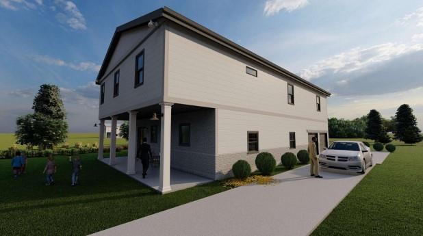 6848 Silver Maple Drive Rex, GA 30273 - Photo 3 of 6 a front view of a house with garden