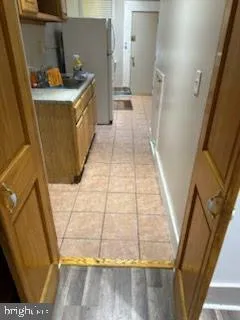 a bathroom with a sink a toilet and a shower