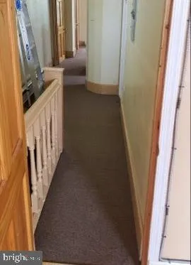 a view of a stairs and an entryway