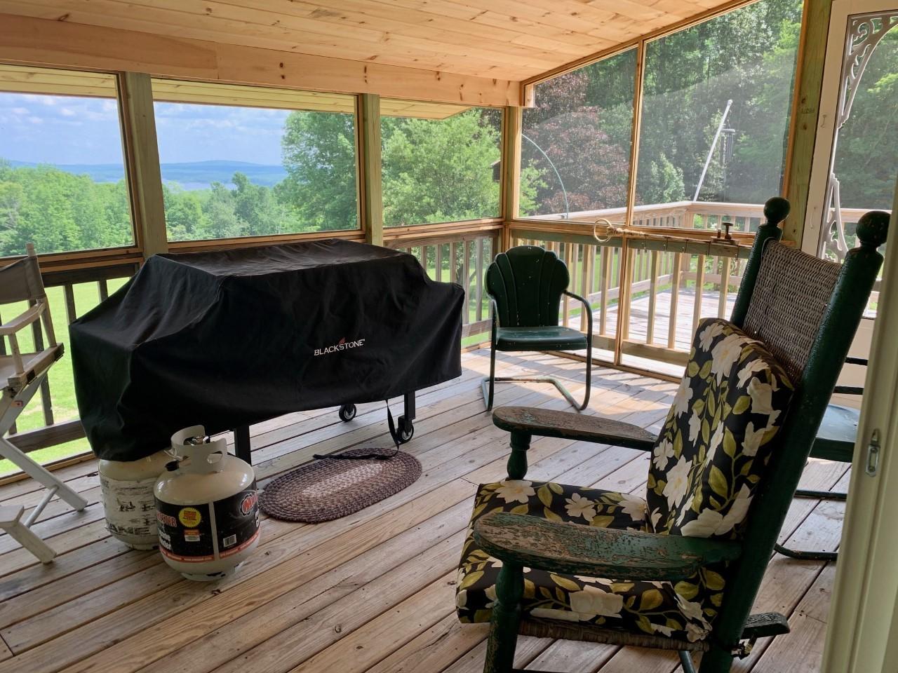62 North Merrill Road Harmony, ME 04942 - Photo 5 of 13 #6 New Screened in Deck porch is the p