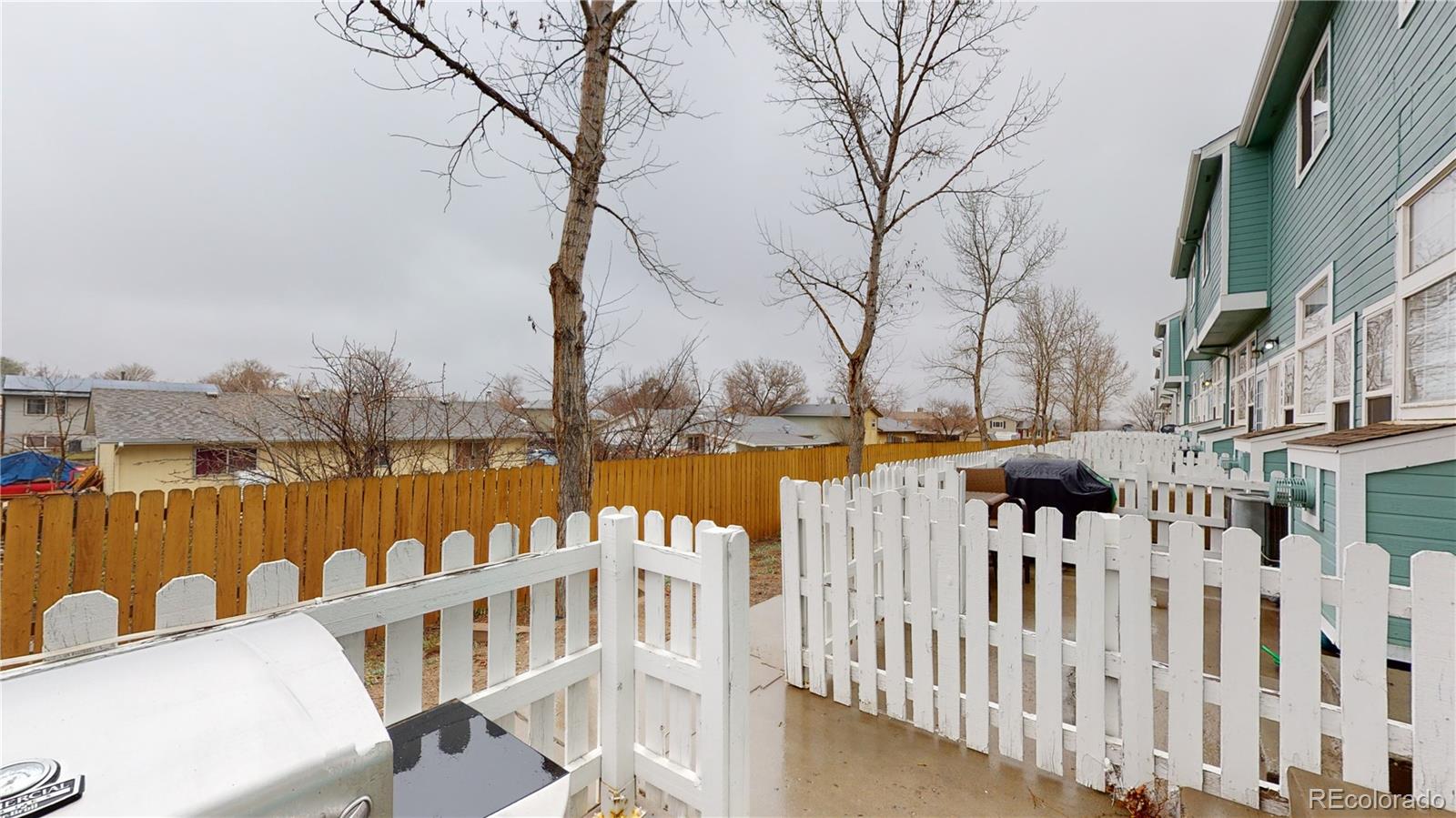 8199 Welby Road, Unit 4001 Denver, CO 80229 - Photo 2 of 24 a view of a lake with a chairs