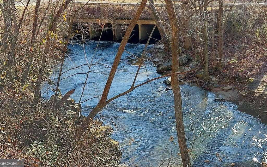 193 Opossum Road, Unit 61 Blairsville, GA 30512 - Photo 6 of 25 a house view with a backyard space