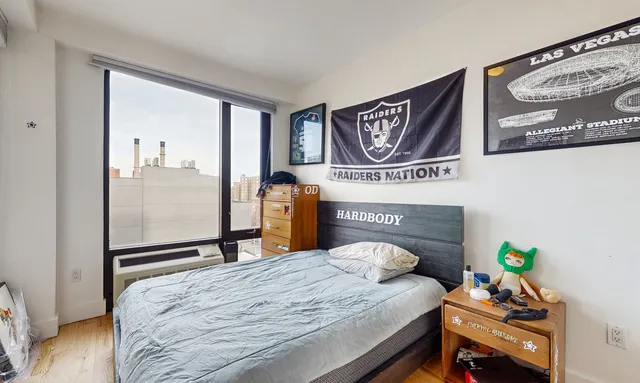 a kitchen with stainless steel appliances granite countertop a sink and a refrigerator