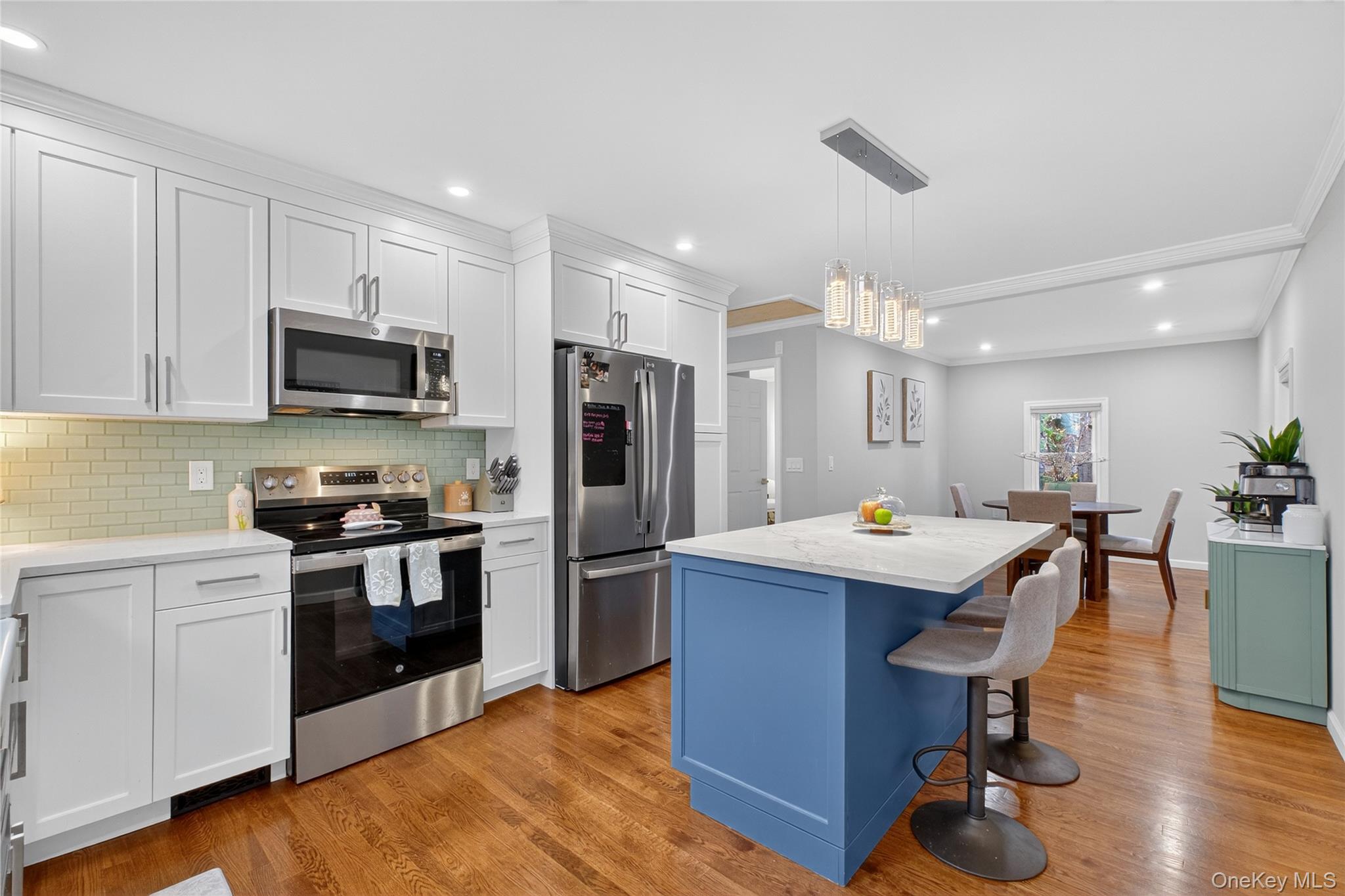 12 Russell Road Wappingers Falls, NY 12590 - Photo 11 of 34 a kitchen with granite countertop a sink appliances and cabinets