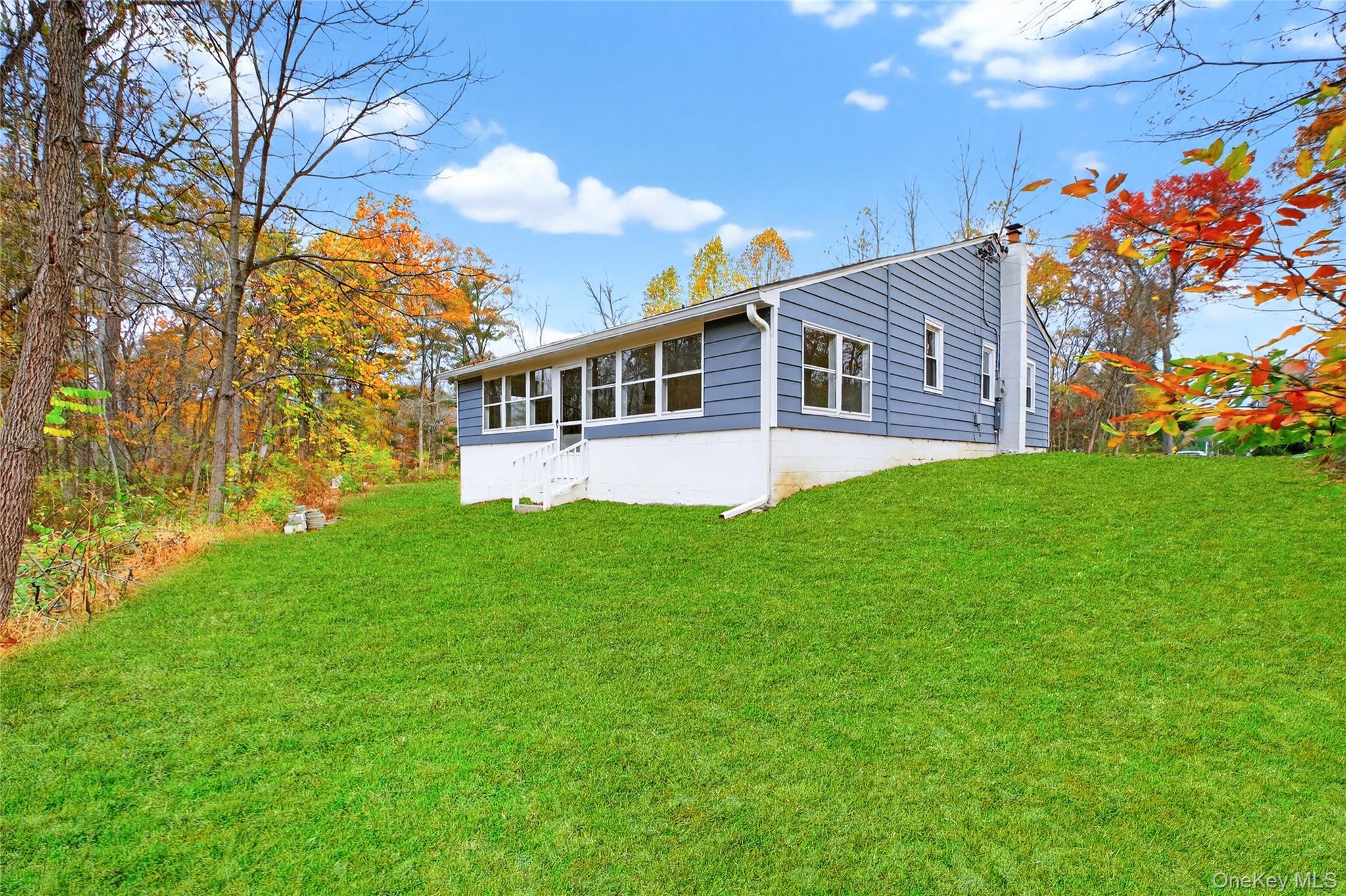 12 Russell Road Wappingers Falls, NY 12590 - Photo 29 of 34 a front view of a house with a garden