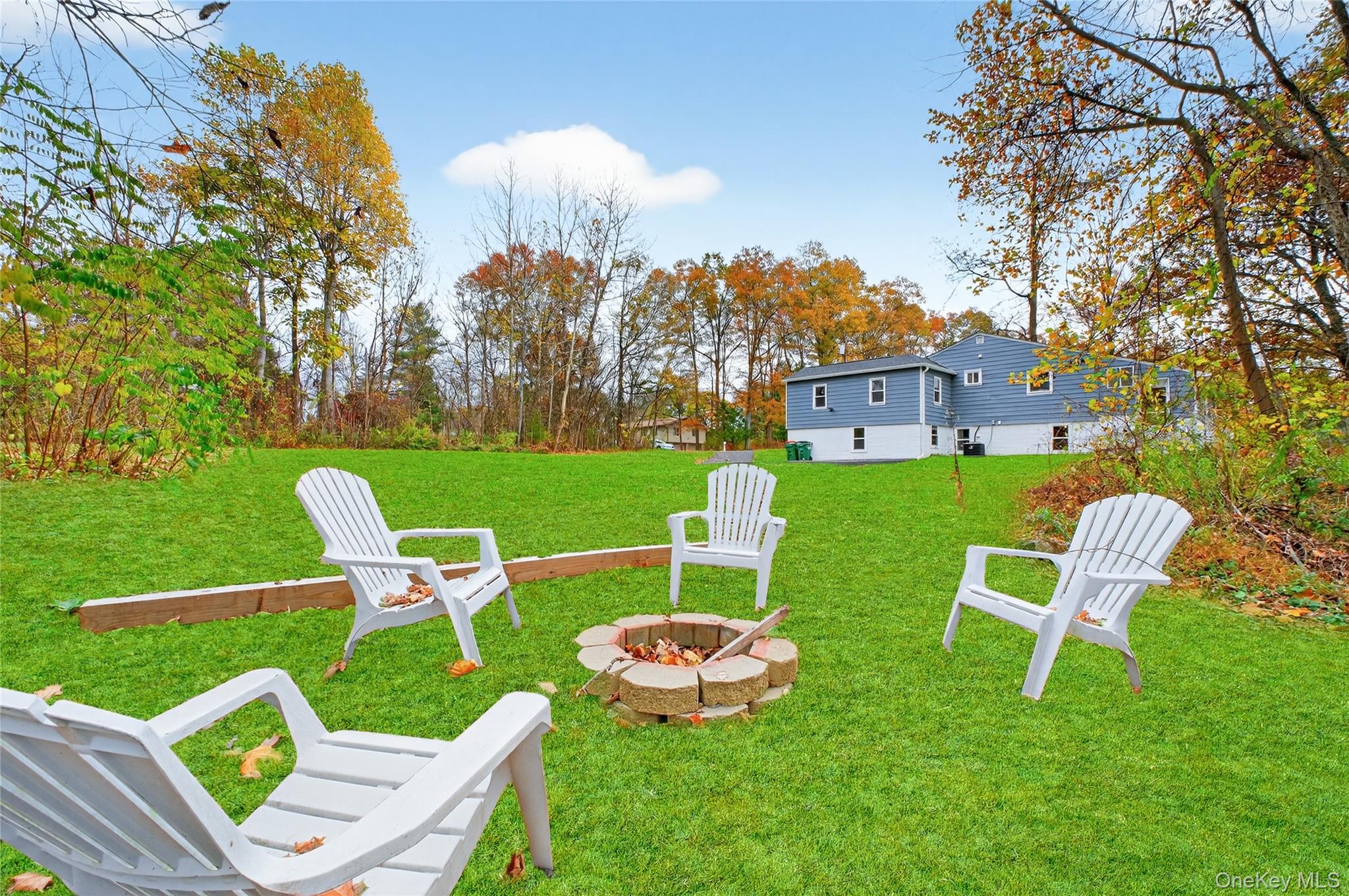 12 Russell Road Wappingers Falls, NY 12590 - Photo 31 of 34 a view of a chair and table in the garden