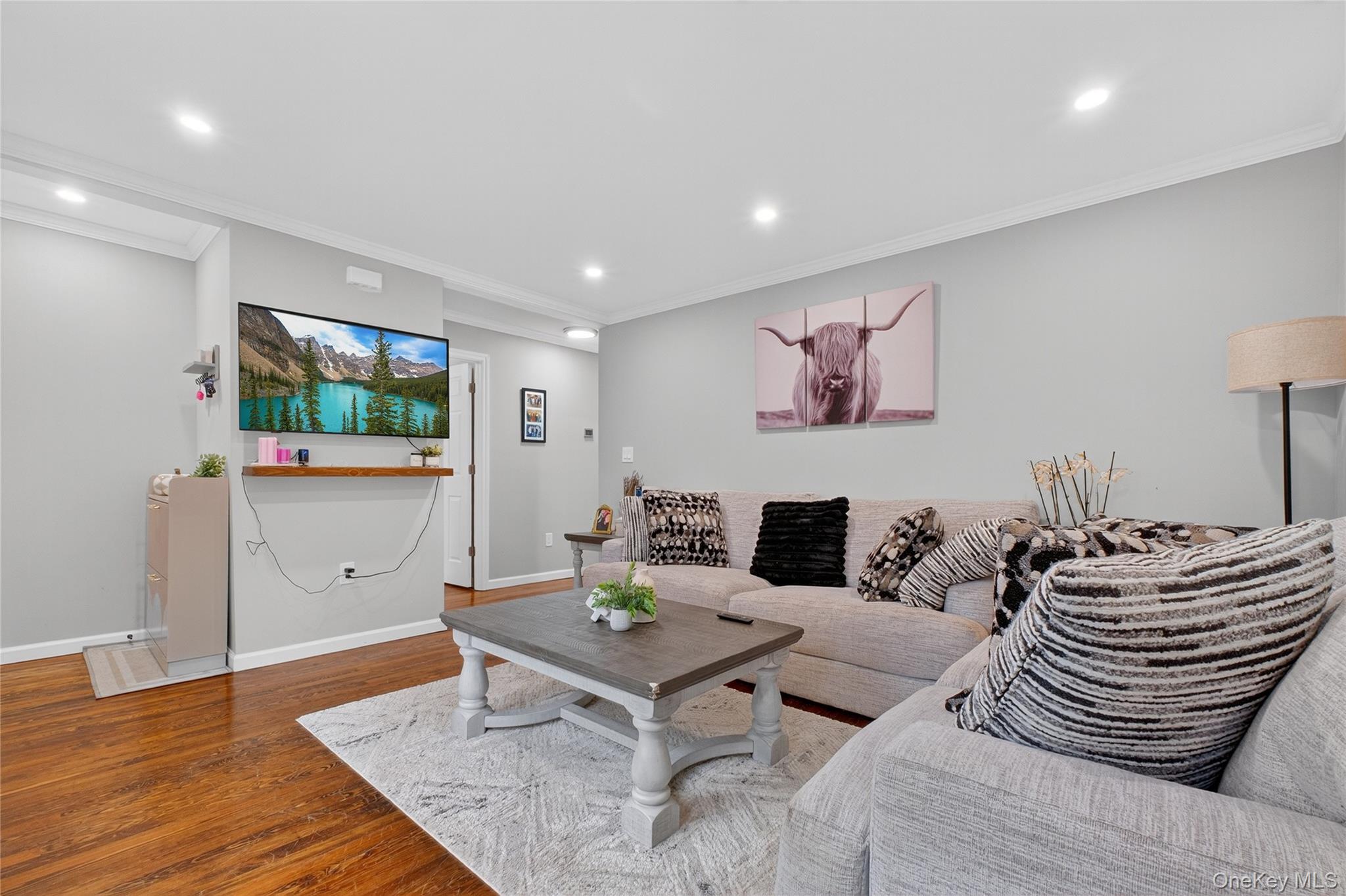 12 Russell Road Wappingers Falls, NY 12590 - Photo 6 of 34 a living room with furniture and a flat screen tv
