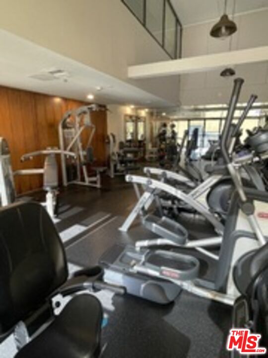 880 West 1st Street, Unit 613 Los Angeles, CA 90012 - Photo 23 of 27 a view of a room with gym equipment