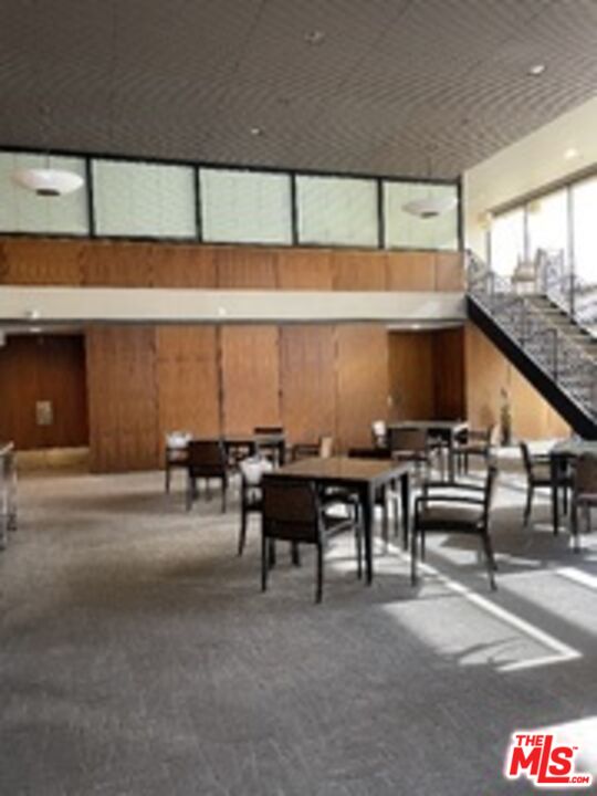 880 West 1st Street, Unit 613 Los Angeles, CA 90012 - Photo 26 of 27 a view of a patio with table and chairs