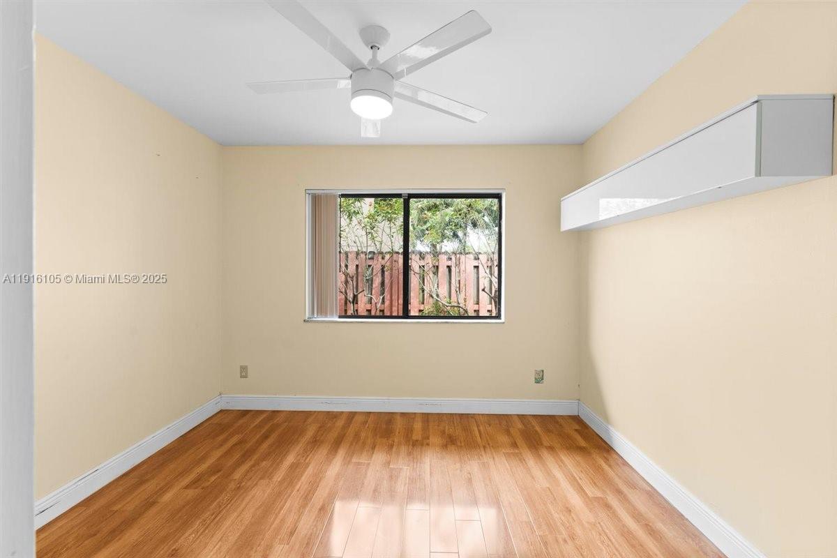9231 Southwest 150th Avenue Miami, FL 33196 - Photo 34 of 51 an empty room with a window