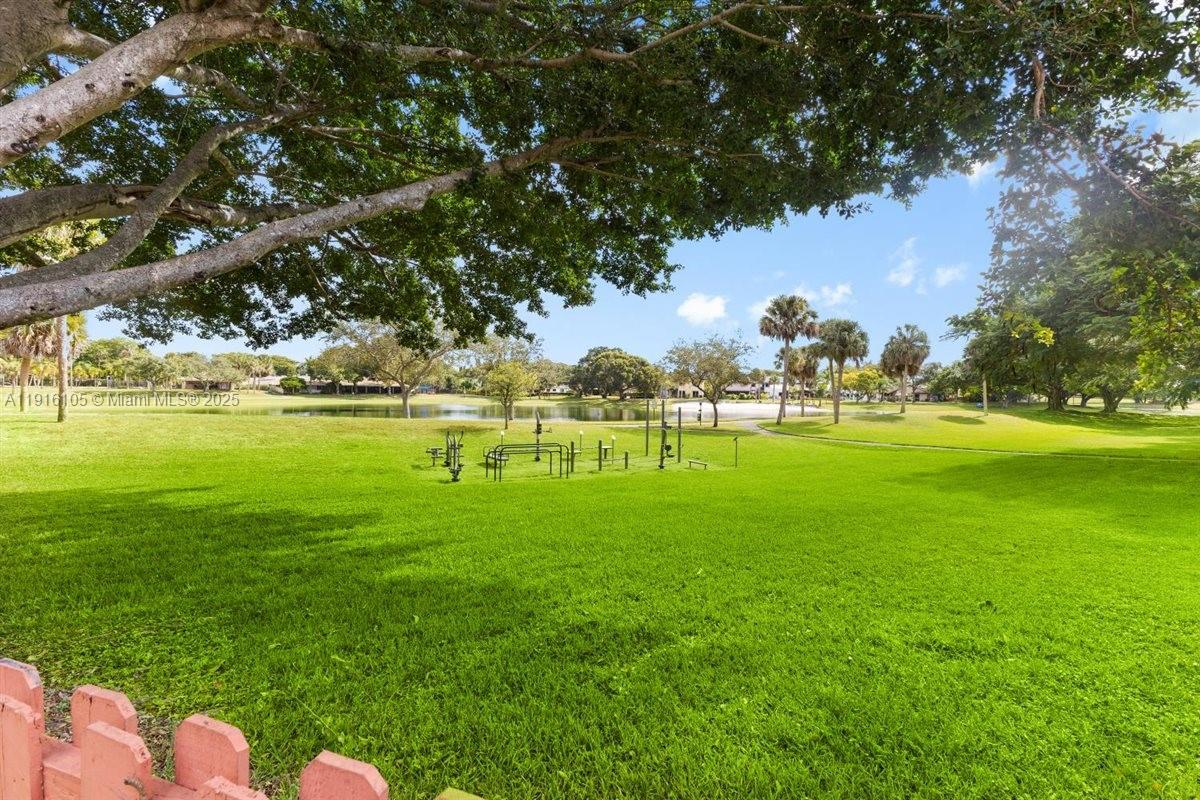 9231 Southwest 150th Avenue Miami, FL 33196 - Photo 41 of 51 a view of a golf course with a lake view