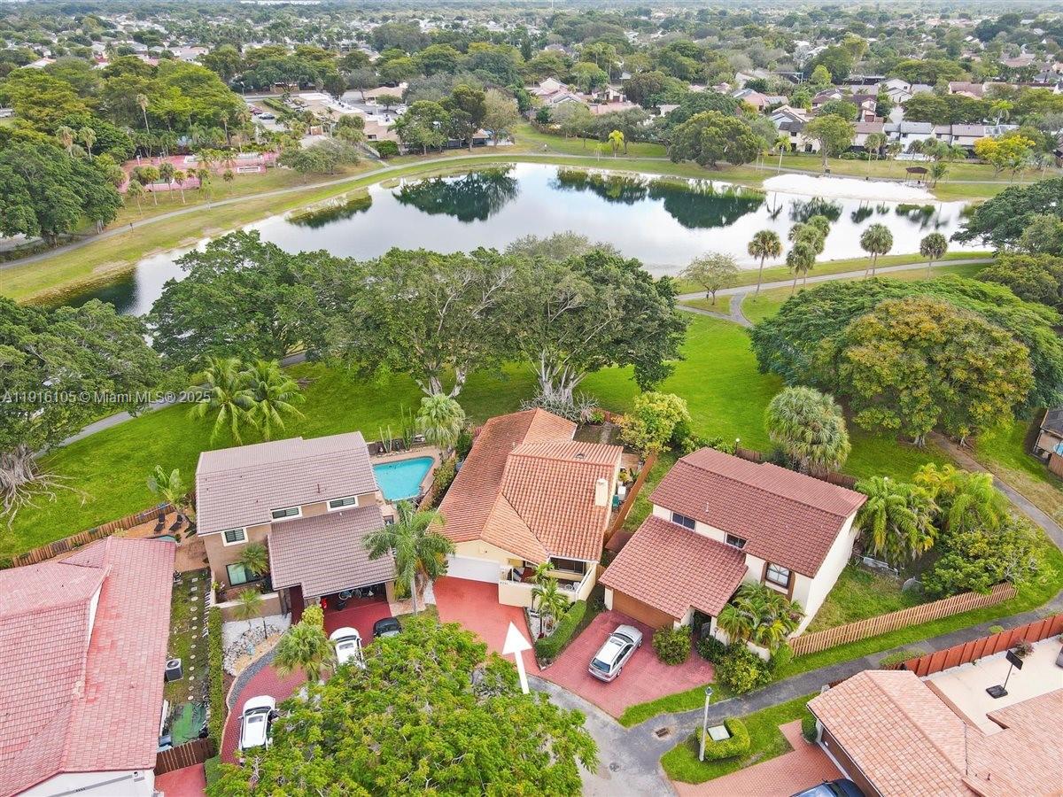 9231 Southwest 150th Avenue Miami, FL 33196 - Photo 46 of 51 an aerial view of residential houses with outdoor space and river