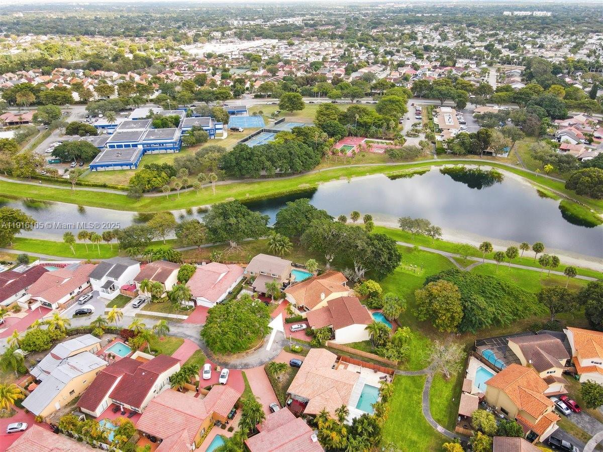 9231 Southwest 150th Avenue Miami, FL 33196 - Photo 47 of 51 an aerial view of residential houses with outdoor space