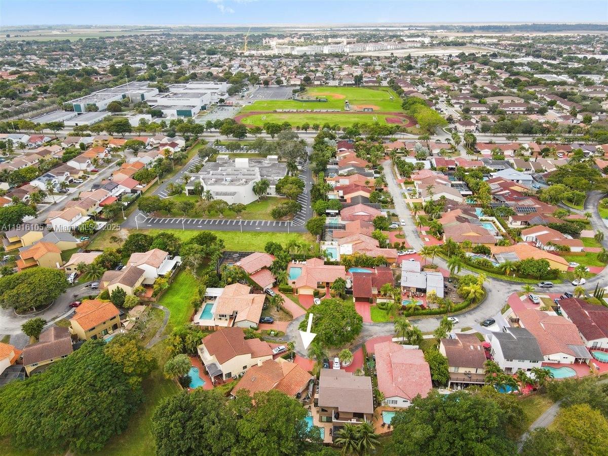 9231 Southwest 150th Avenue Miami, FL 33196 - Photo 48 of 51 an aerial view of residential houses with outdoor space
