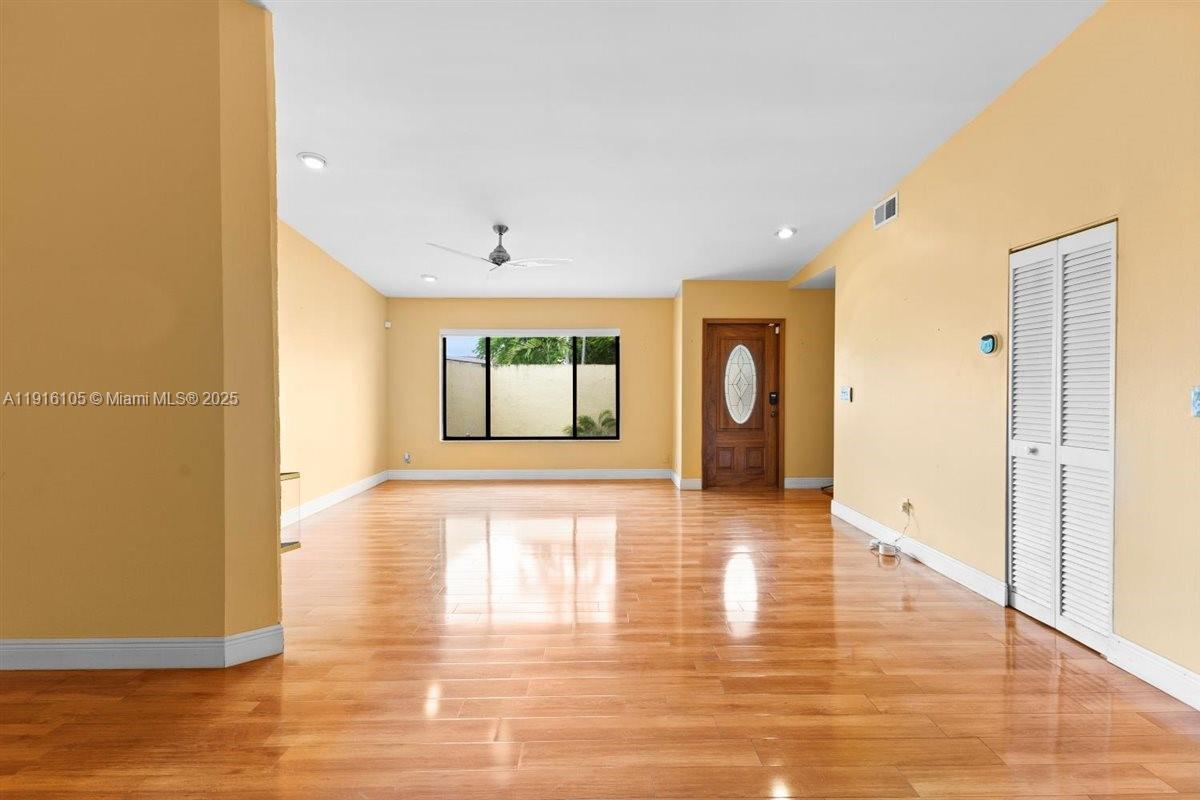9231 Southwest 150th Avenue Miami, FL 33196 - Photo 8 of 51 a view of a livingroom with wooden floor