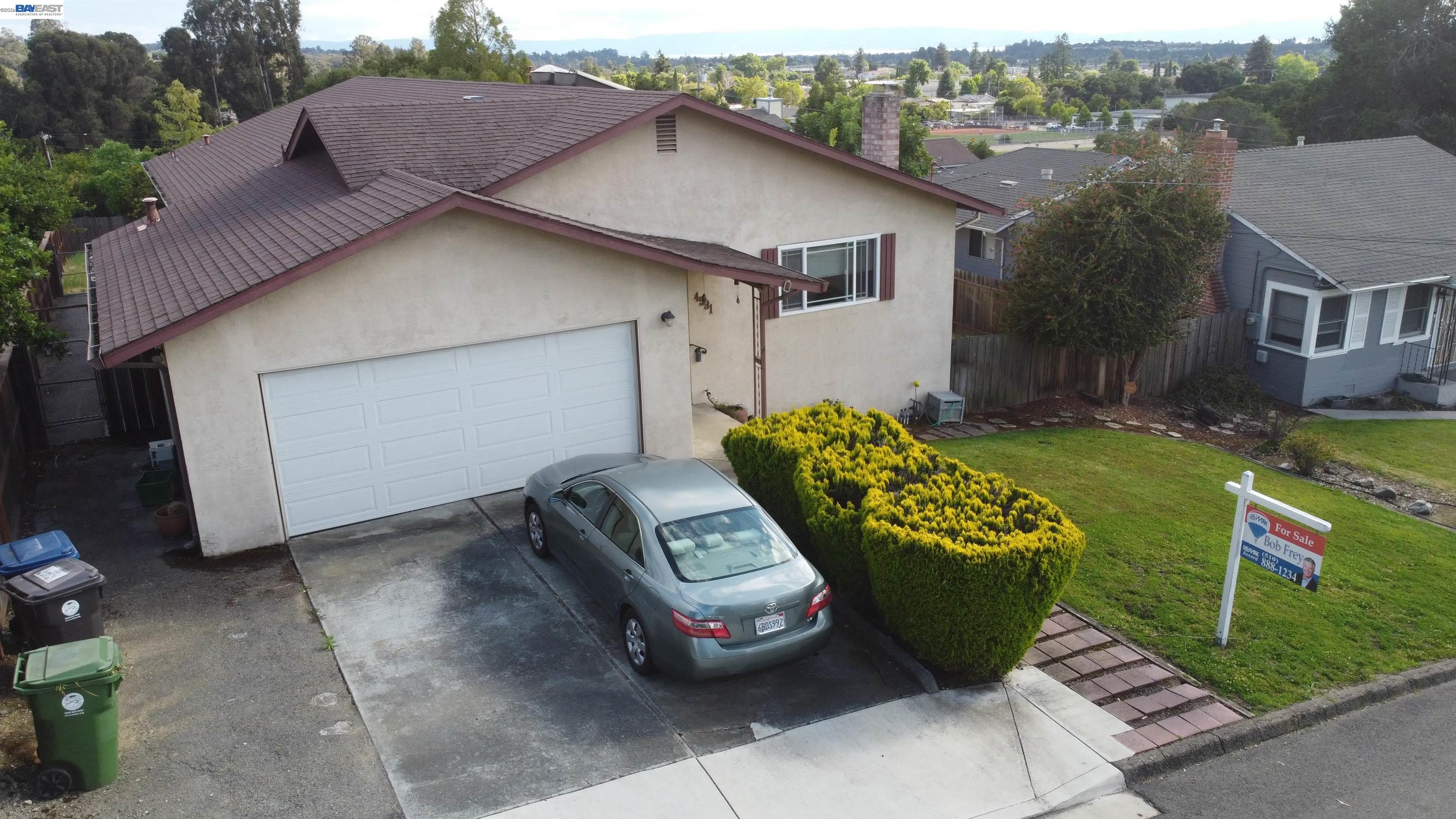 4591 Edwards Lane Castro Valley, CA 94546 - Photo 43 of 44 a front view of a house with a garden