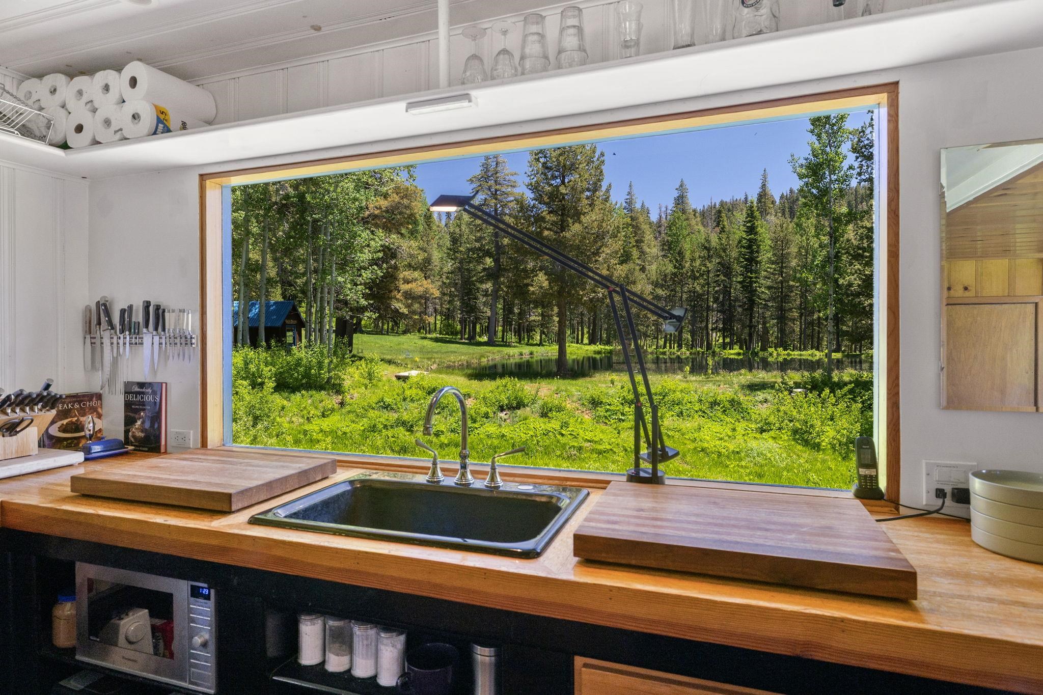 40600 Highway 49 Calpine, CA 96124 - Photo 22 of 28 a view of a room with a bed and wooden floor