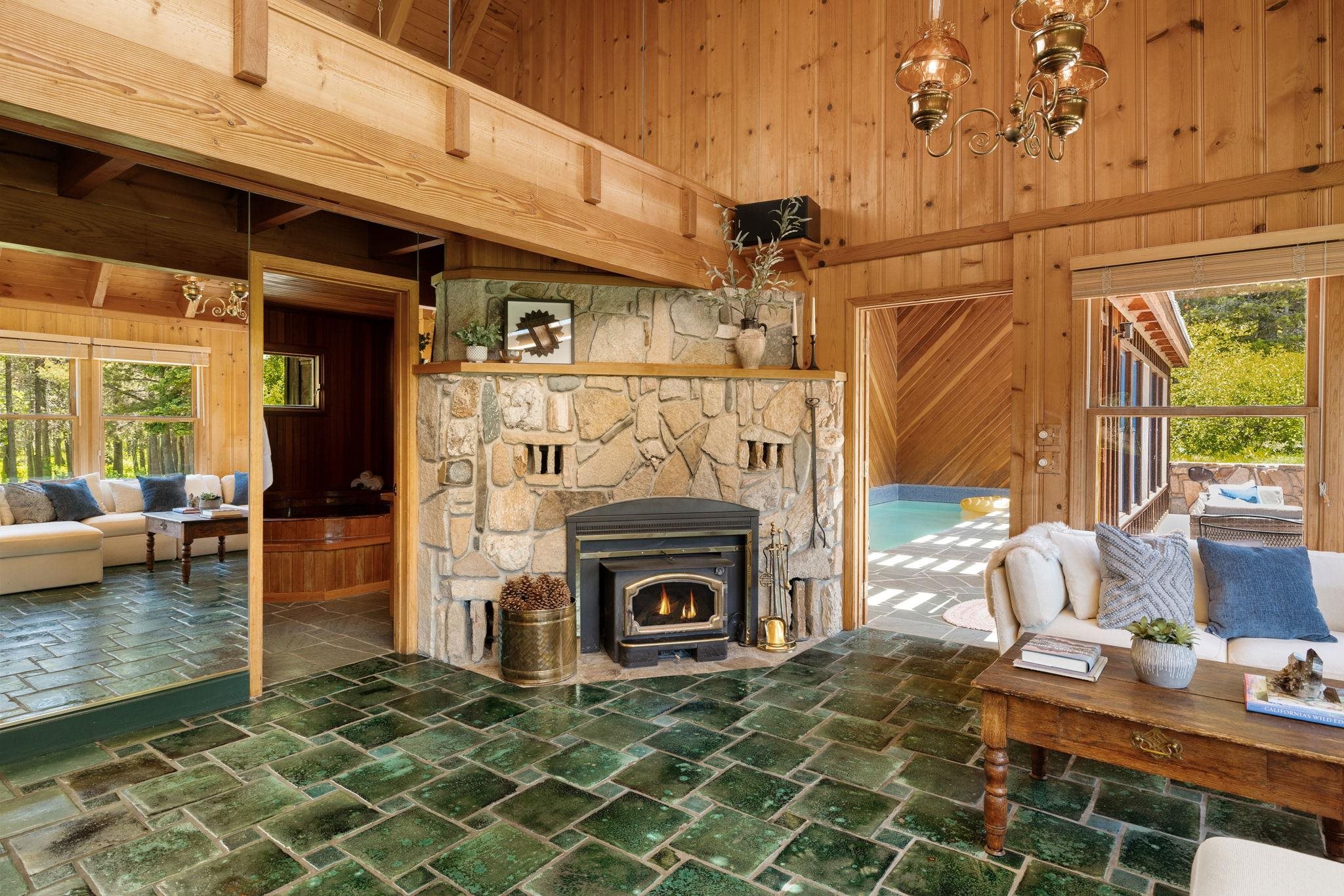 40600 Highway 49 Calpine, CA 96124 - Photo 9 of 28 a living room with fireplace furniture and a fireplace
