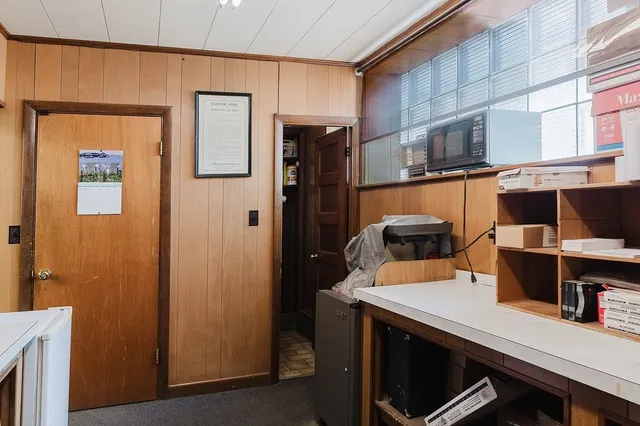 a view of a dining room with furniture